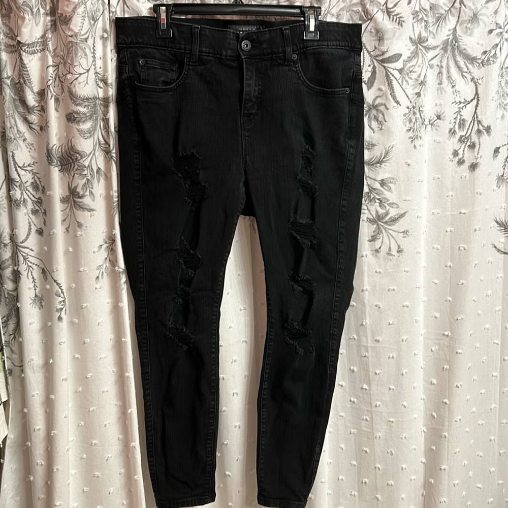 TORRID Black ripped jeans size 16S. Fits like a 14S.